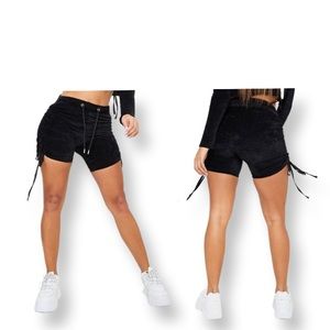 PrettyLittleThing SHAPE BLACK VELOUR RUCHED SIDE SHORTS